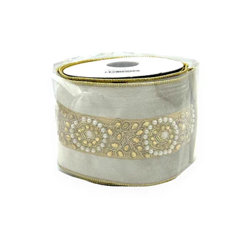 4"5YD Jewel trim in the center of ivory velvet